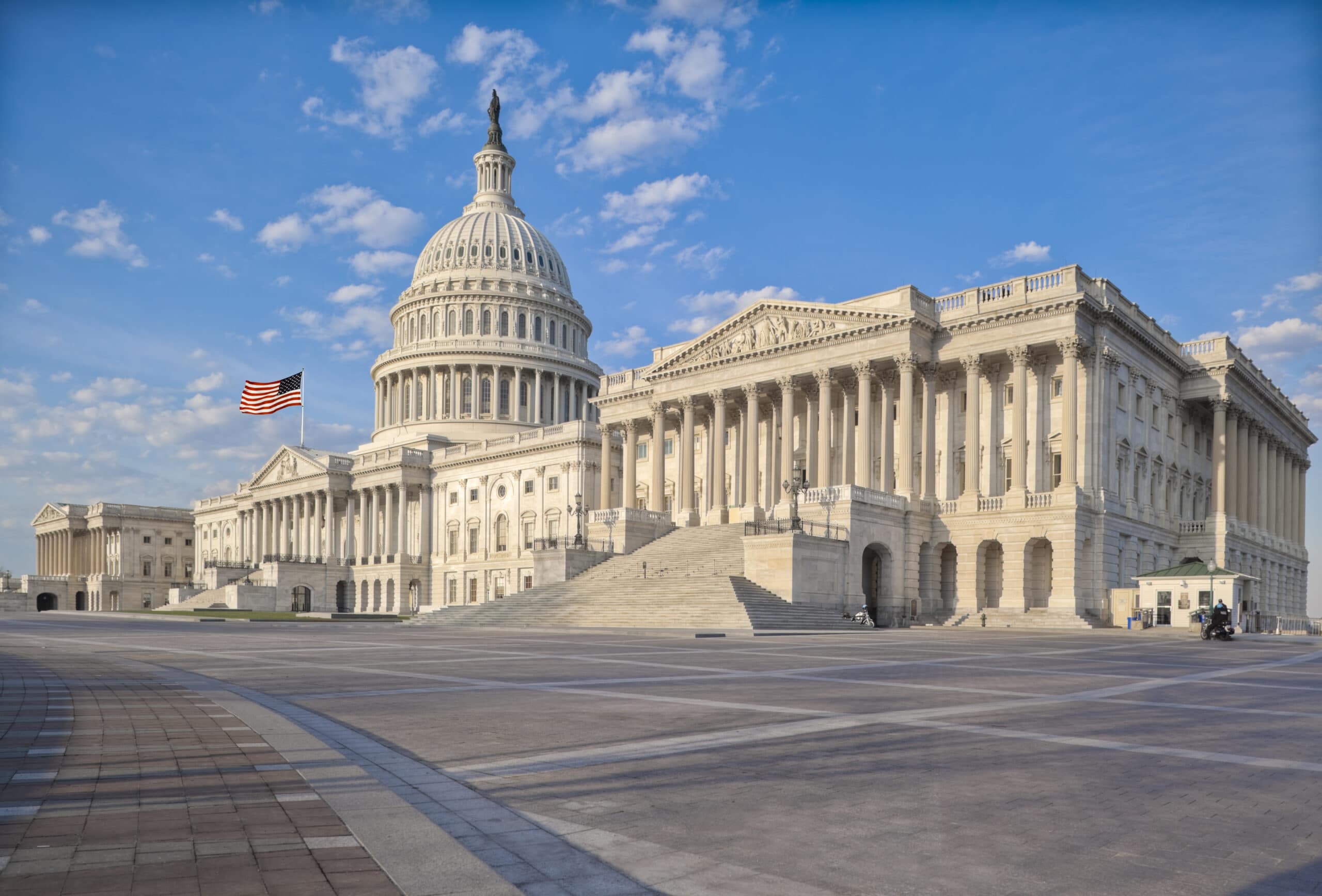 The east side of the US Capitol in the early morning. Senate Chamber in the foreground.