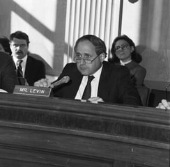 Senator Levin seated at a hearing in 1986